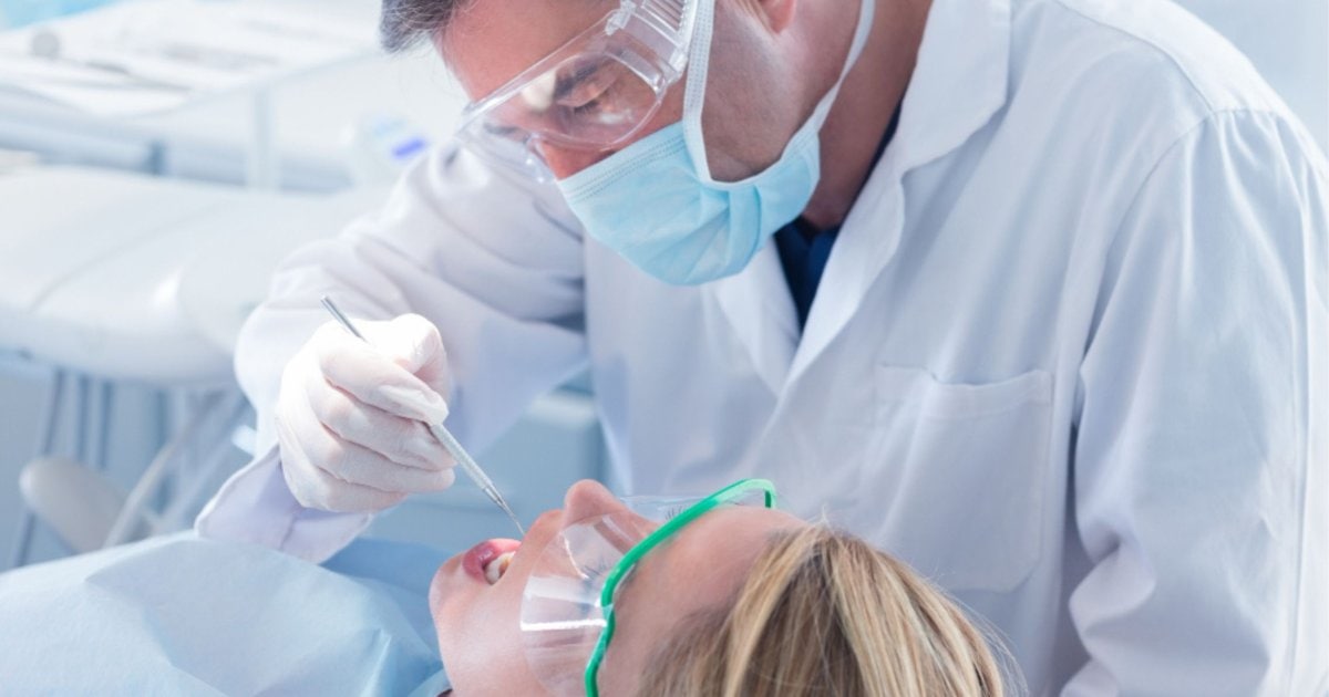 Dentist performing a dental check-up and clean in Campbelltown